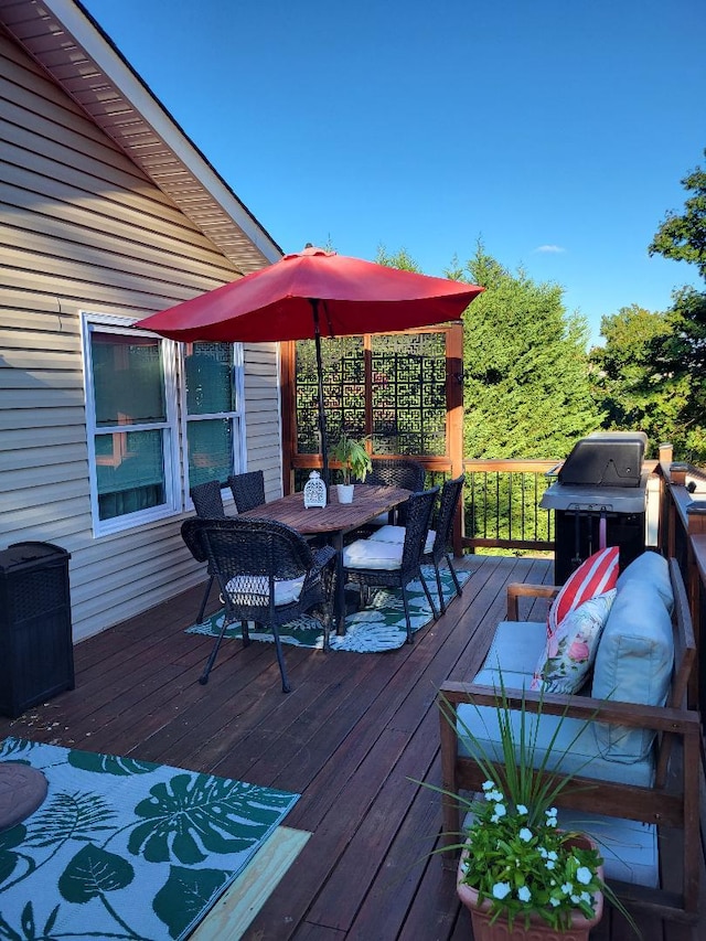 2892 Wilson Ave, Bellmore, NY 11710 - wooden deck with outdoor dining space