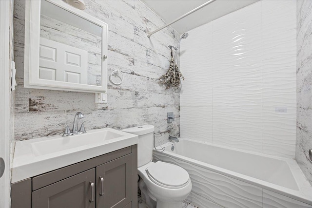 full bath with bathing tub / shower combination, toilet, and vanity