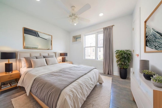 bedroom featuring wood finished floors, ceiling fan, and recessed lighting