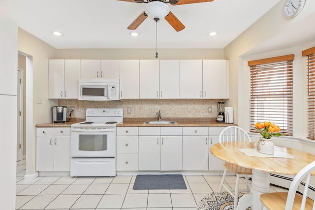 kitchen with white cabinetry, white appliances, light tile patterned floors, a sink, and ceiling fan