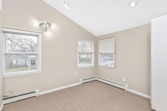 unfurnished room with baseboards, lofted ceiling, carpet flooring, and baseboard heating