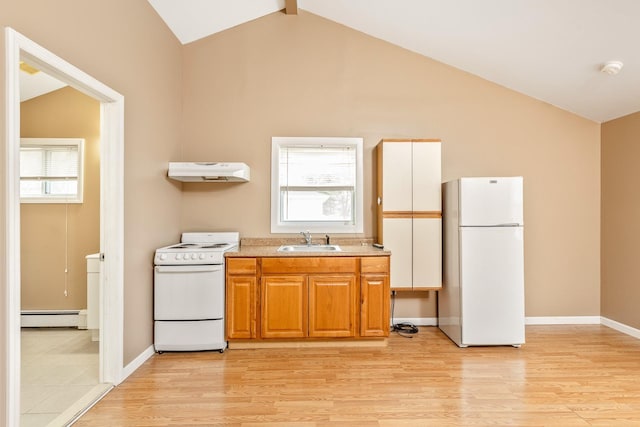 kitchen featuring vaulted ceiling, a sink, under cabinet range hood, white appliances, and a baseboard heating unit