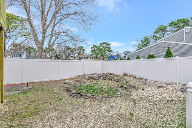 view of yard featuring a fenced backyard