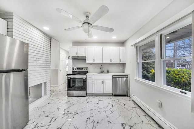 173 Bloomingdale Rd, Levittown, NY 11756 - kitchen with marble finish floor, light countertops, a sink, stainless steel appliances, and a baseboard radiator