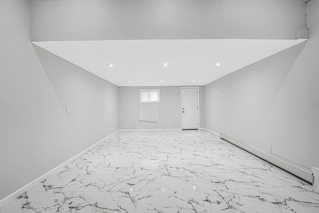 173 Bloomingdale Rd, Levittown, NY 11756 - spare room featuring baseboards, recessed lighting, marble finish floor, and a baseboard heating unit