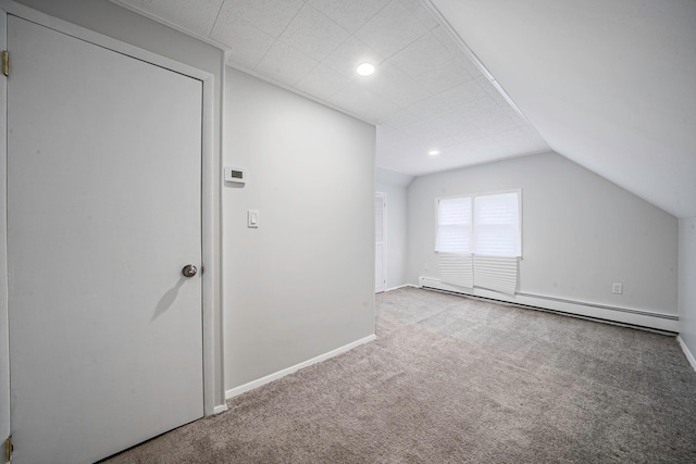 173 Bloomingdale Rd, Levittown, NY 11756 - additional living space with lofted ceiling, carpet, baseboards, and baseboard heating