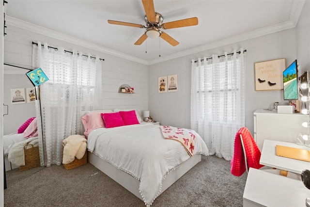 bedroom with carpet floors, ornamental molding, and multiple windows
