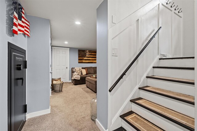 stairs featuring baseboards, carpet floors, and recessed lighting