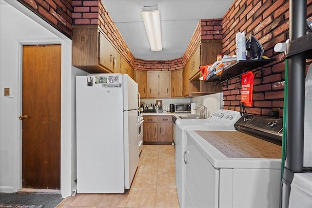 21-51 48th St, Astoria, NY 11105 - laundry room with light tile patterned floors and separate washer and dryer