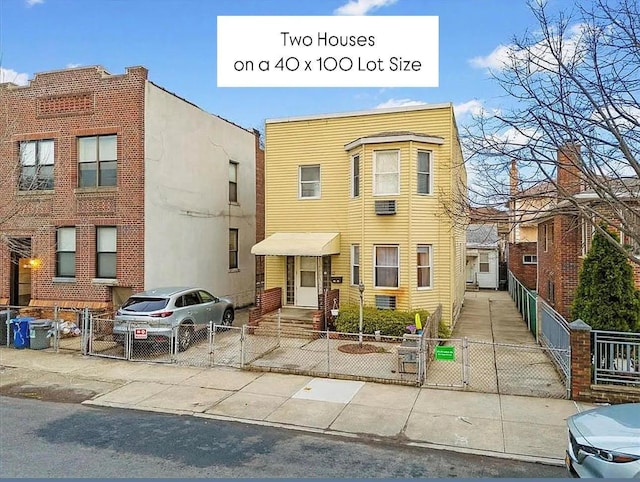 21-51 48th St, Astoria, NY 11105 - multi unit property with a gate and a fenced front yard