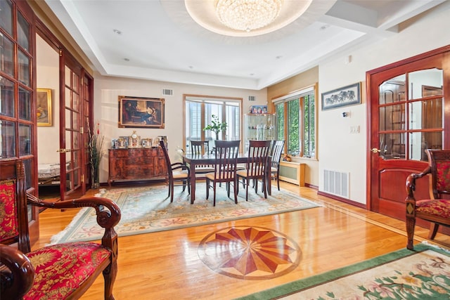 71-38 Harrow St, Forest Hills, NY 11375 - dining space with wood finished floors and a chandelier