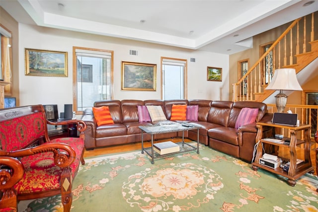 71-38 Harrow St, Forest Hills, NY 11375 - living area featuring stairway and a raised ceiling