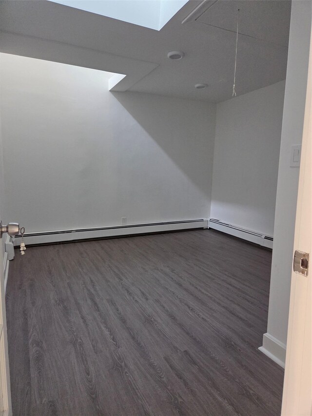 111 Washington St, Port Chester, NY 10573 - unfurnished room with dark wood-style flooring and attic access