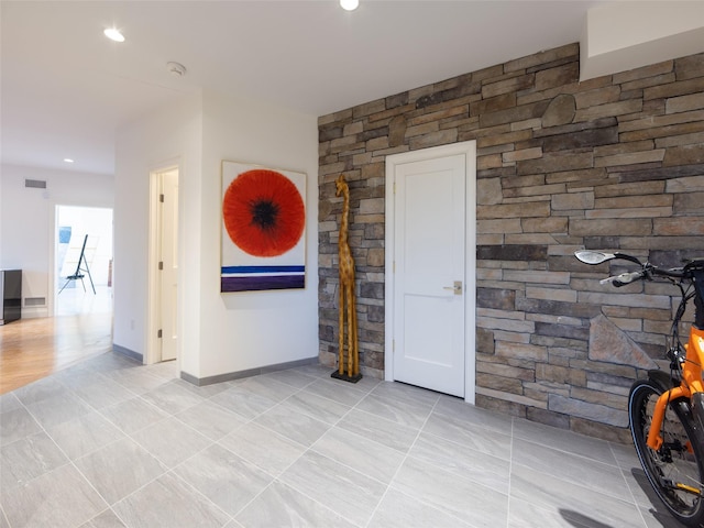interior space featuring recessed lighting, tile patterned flooring, and baseboards