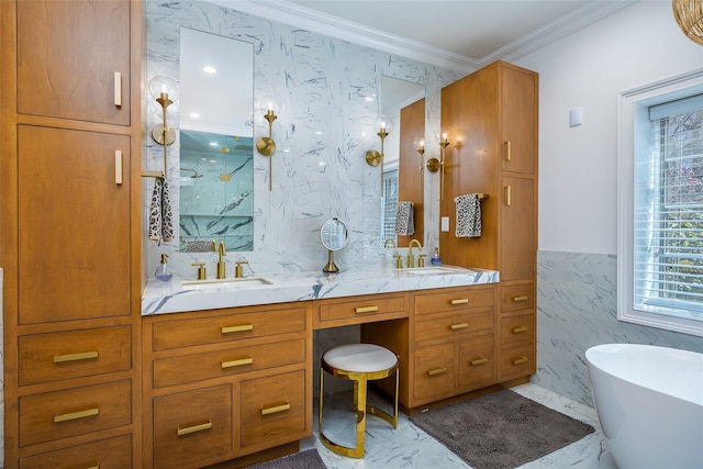 full bath with a marble finish shower, marble finish floor, crown molding, and a sink