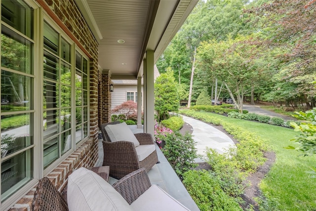 view of patio featuring a porch