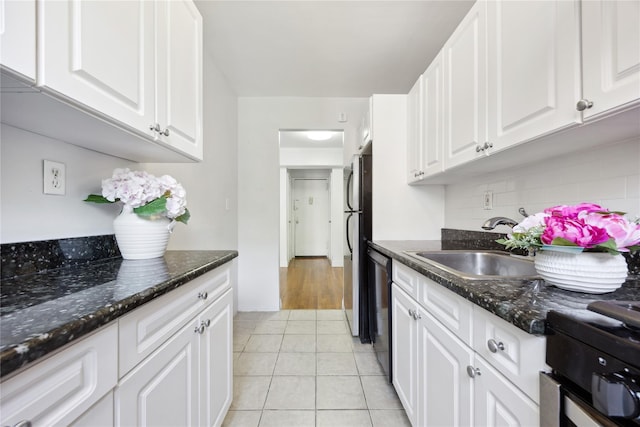 150-10 71st Ave Unit 3L, Flushing, NY 11367 - kitchen featuring dishwasher, white cabinets, a sink, and light tile patterned flooring