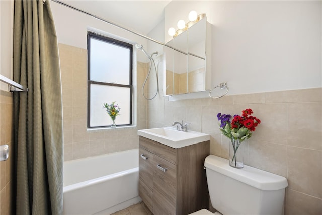 150-10 71st Ave Unit 3L, Flushing, NY 11367 - bathroom featuring tile walls, shower / bath combination with curtain, vanity, and toilet