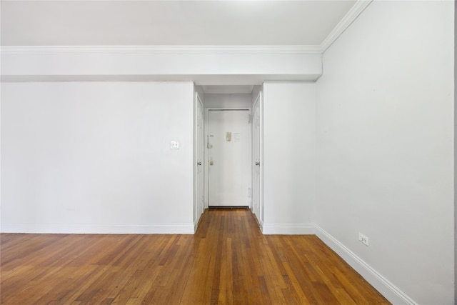 150-10 71st Ave Unit 3L, Flushing, NY 11367 - empty room featuring baseboards, hardwood / wood-style flooring, and crown molding