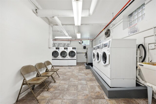 150-10 71st Ave Unit 3L, Flushing, NY 11367 - community laundry featuring washer and dryer and light stone finish flooring