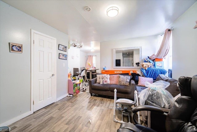 6 Farrington St, Newburgh, NY 12550 - living area with baseboards and light wood-style floors
