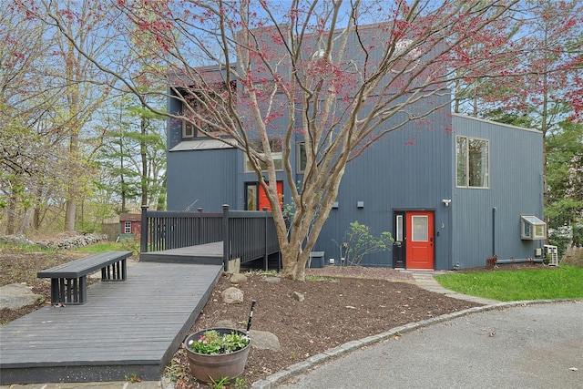 contemporary house featuring a deck