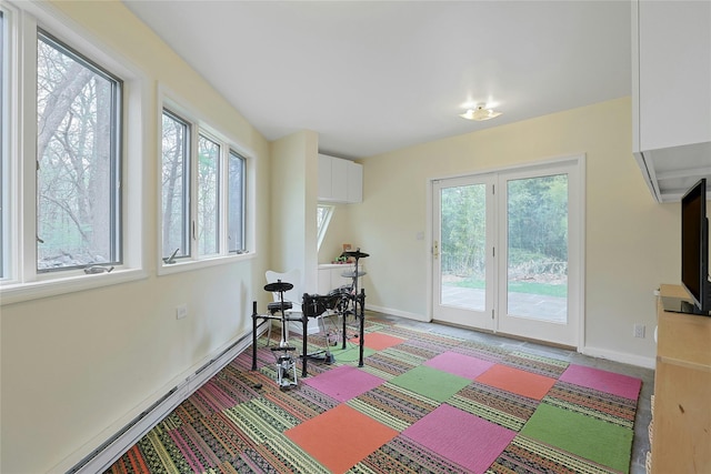sitting room with baseboards and baseboard heating