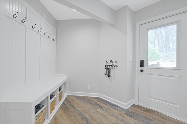 mudroom featuring light wood-type flooring and baseboards