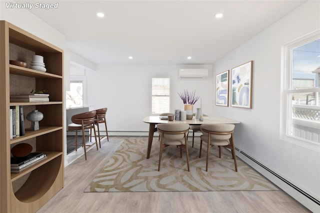 82 Albertson Pl, Mineola, NY 11501 - dining space featuring a wall mounted AC, baseboard heating, a baseboard heating unit, light wood finished floors, and recessed lighting