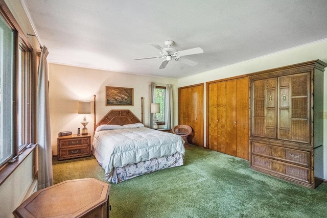59 Giant Oak Rd, Ridge, NY 11961 - carpeted bedroom with two closets and ceiling fan
