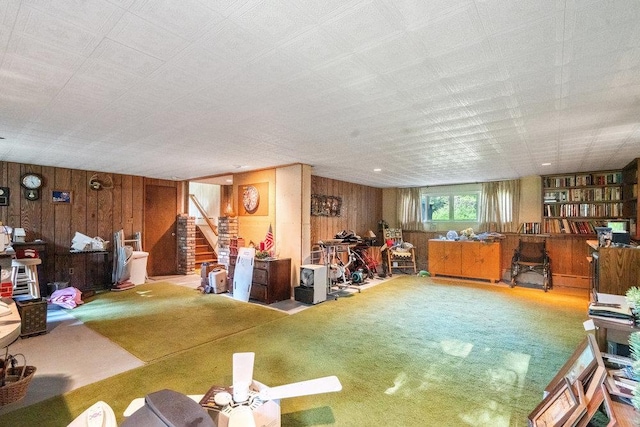 59 Giant Oak Rd, Ridge, NY 11961 - living room featuring wood walls and stairs