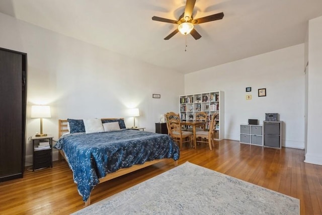 1185 E Broadway Unit 4A, Hewlett, NY 11557 - bedroom with baseboards, a ceiling fan, and wood-type flooring