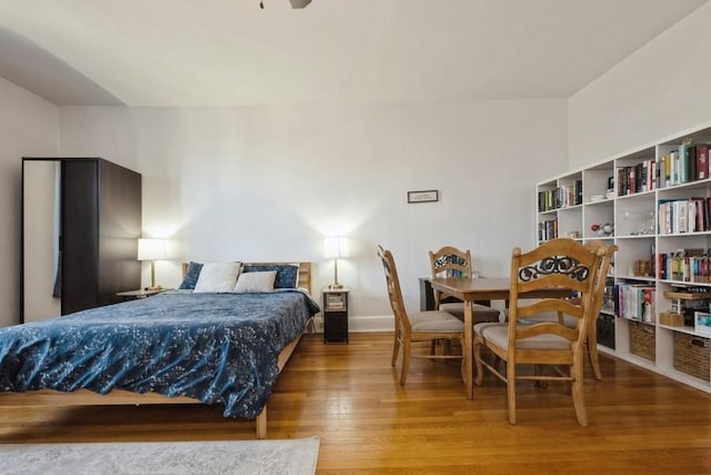 1185 E Broadway Unit 4A, Hewlett, NY 11557 - bedroom with baseboards and wood finished floors