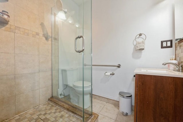 1185 E Broadway Unit 4A, Hewlett, NY 11557 - bathroom with a shower stall, tile patterned floors, toilet, and vanity