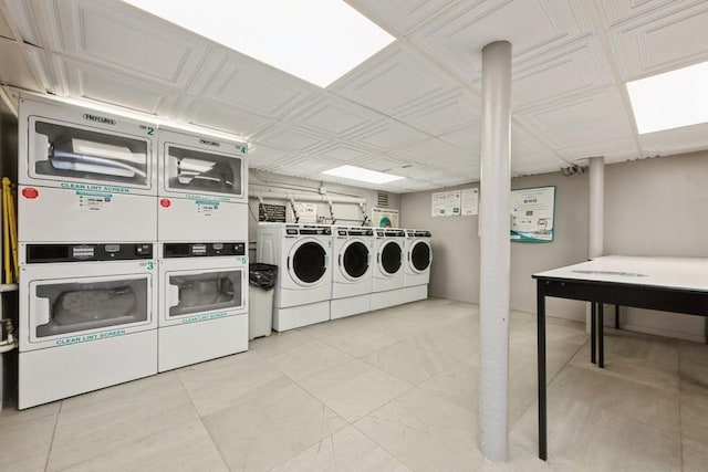 1185 E Broadway Unit 4A, Hewlett, NY 11557 - common laundry area with stacked washer and dryer, an ornate ceiling, and separate washer and dryer