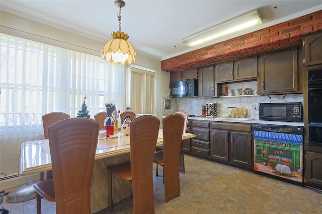 dining space featuring ornamental molding