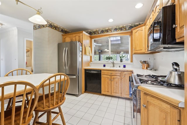 kitchen with light tile patterned floors, a sink, light countertops, black appliances, and recessed lighting