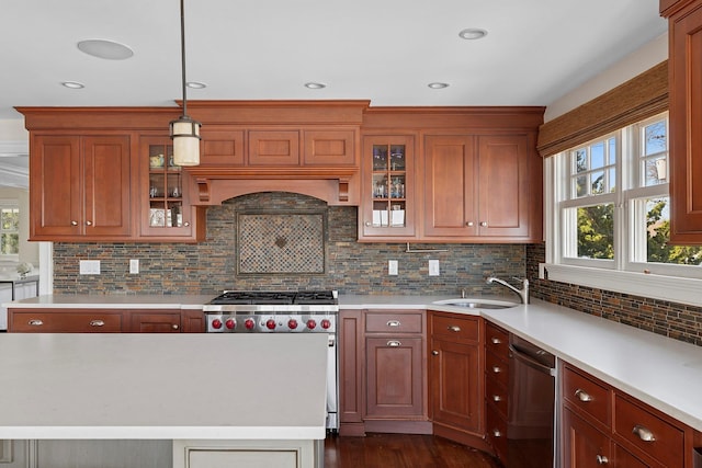 356 Bay Ave, Huntington Bay, NY 11743 - kitchen with light countertops, backsplash, a wealth of natural light, appliances with stainless steel finishes, and a sink