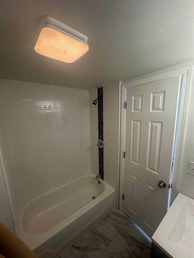 300 Prairie Dr, North Babylon, NY 11703 - full bath featuring washtub / shower combination and marble finish floor
