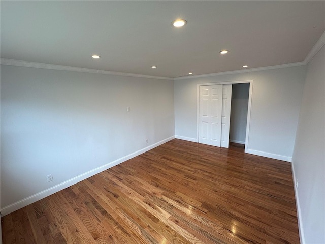 300 Prairie Dr, North Babylon, NY 11703 - unfurnished bedroom featuring crown molding and recessed lighting