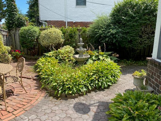 view of yard with fence and a patio area