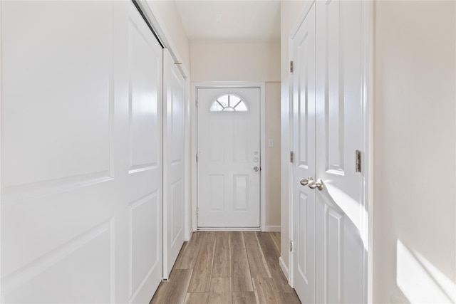 doorway with light wood-style floors