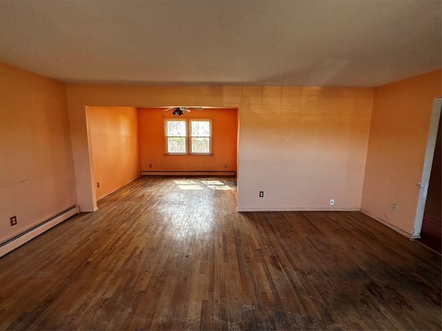 74 Jerusalem Ave, Massapequa, NY 11758 - unfurnished room with baseboards, hardwood / wood-style flooring, ceiling fan, a baseboard radiator, and baseboard heating