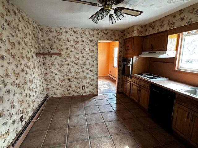 74 Jerusalem Ave, Massapequa, NY 11758 - kitchen with a baseboard radiator, wallpapered walls, under cabinet range hood, and black appliances