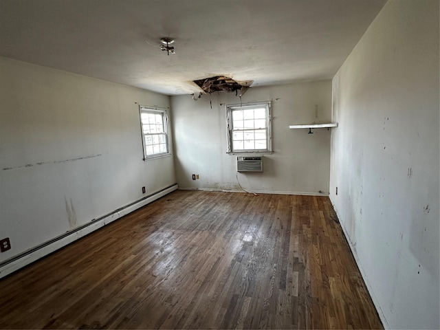 74 Jerusalem Ave, Massapequa, NY 11758 - unfurnished room with wood finished floors, a baseboard heating unit, and a wall unit AC