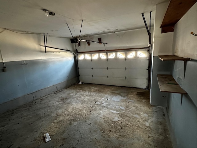 74 Jerusalem Ave, Massapequa, NY 11758 - garage featuring a garage door opener