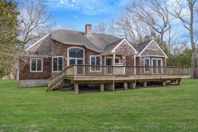 64 Turtle Cove Dr, Southampton, NY 11968 - back of house with roof with shingles, a deck, a yard, and a chimney