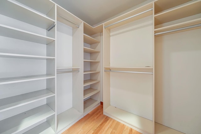 64 Turtle Cove Dr, Southampton, NY 11968 - walk in closet with wood finished floors