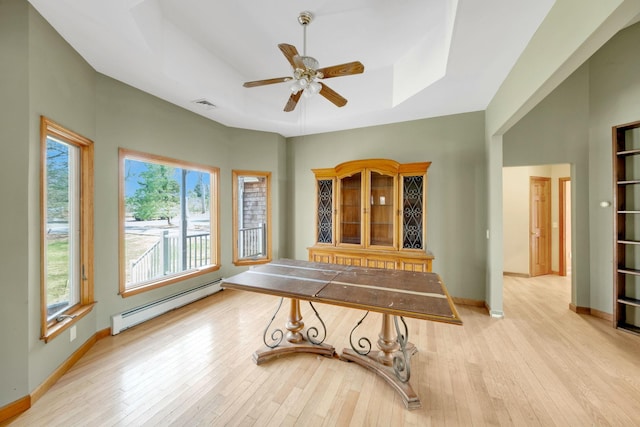 64 Turtle Cove Dr, Southampton, NY 11968 - interior space featuring a raised ceiling, visible vents, light wood finished floors, and baseboard heating