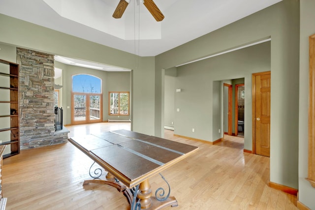 64 Turtle Cove Dr, Southampton, NY 11968 - recreation room with baseboards, light wood-style floors, and ceiling fan